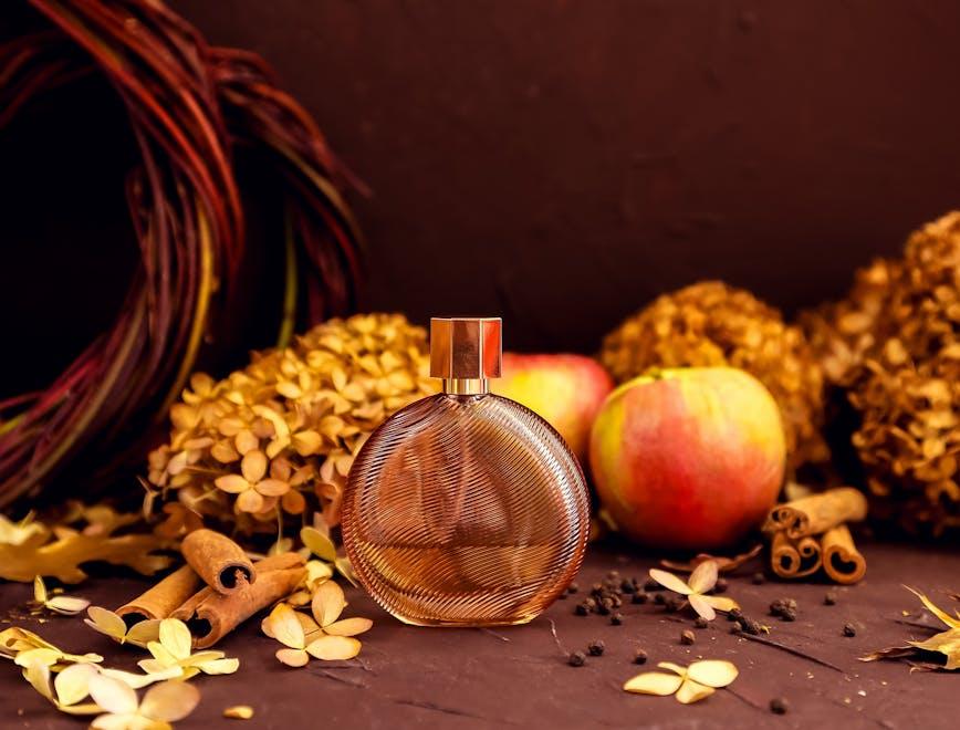 container,beauty,cozy,branding,smell,eau de toilette,unbranded,cosmetic,female,floral,glass,natural,reflection,spray,dry,brown,water,atomizer,aromatherapy,background,autumn,cinnamon,feminine,essence,hydrangea,bottle,odor,perfume,transparent,apple,oil,modern,romantic,honey,design,elegant,organic,product,mock up,scented,label,mockup,flower,fragrance,merchandise,liquid,round,luxury,aroma,essential apple food fruit plant produce bottle cosmetics perfume