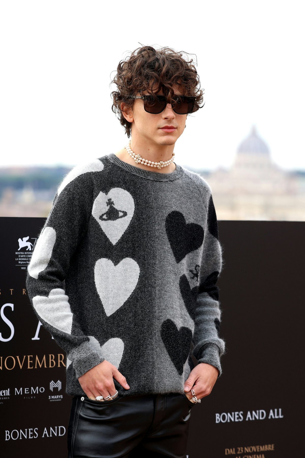 rome sweater knitwear clothing long sleeve sleeve necklace jewelry accessories sweatshirt person