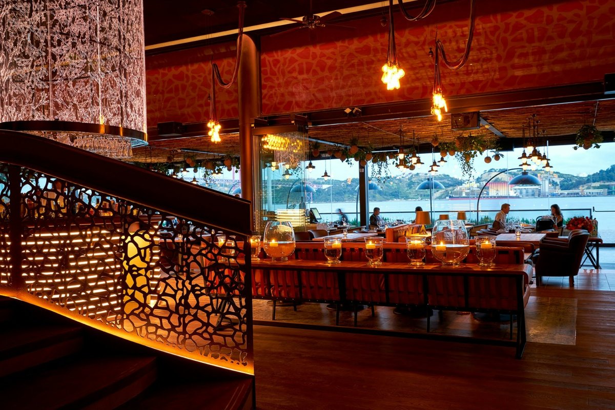 restaurant indoors wood flooring floor dining room dining table hardwood cafeteria interior design