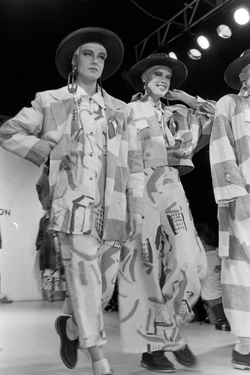 models on runway wearing patterned suits