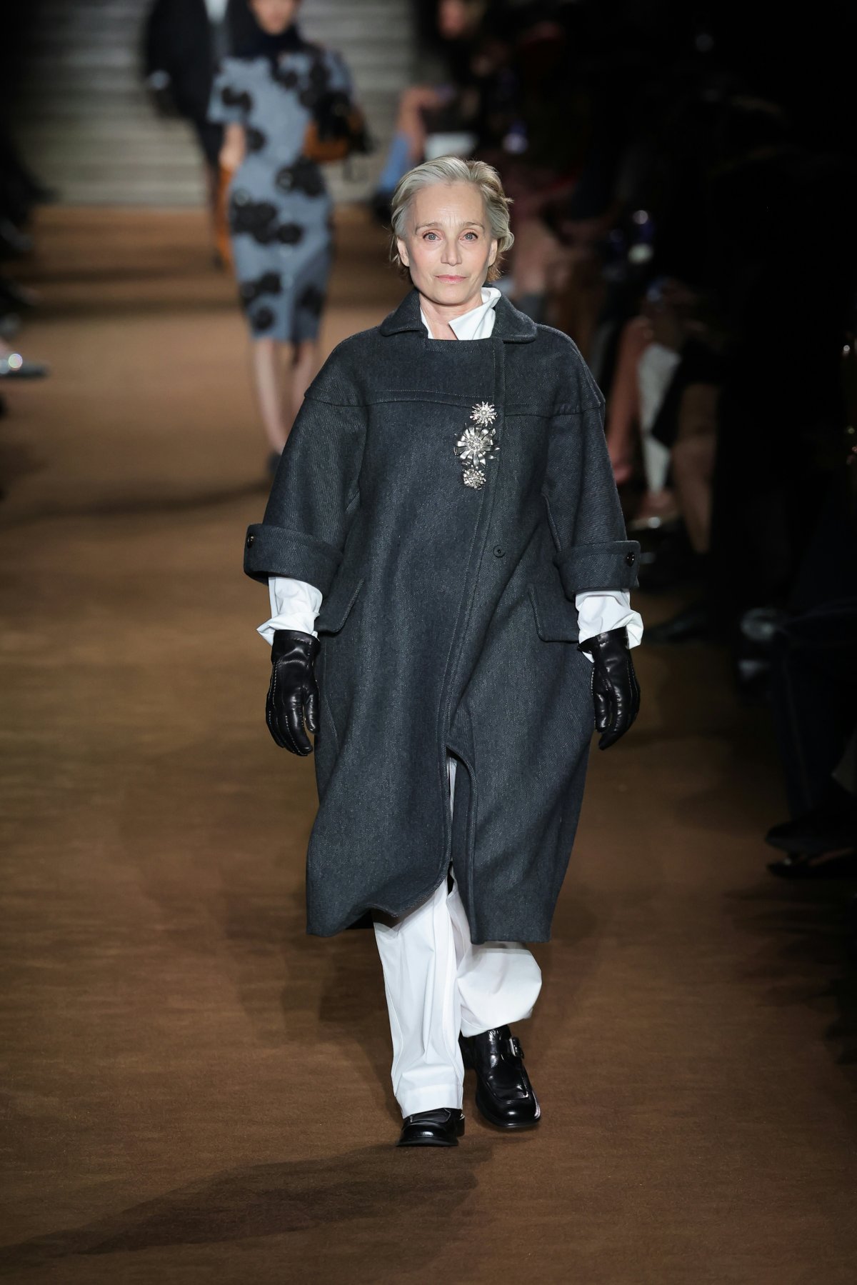 paris lady person clothing glove fashion coat footwear shoe face head