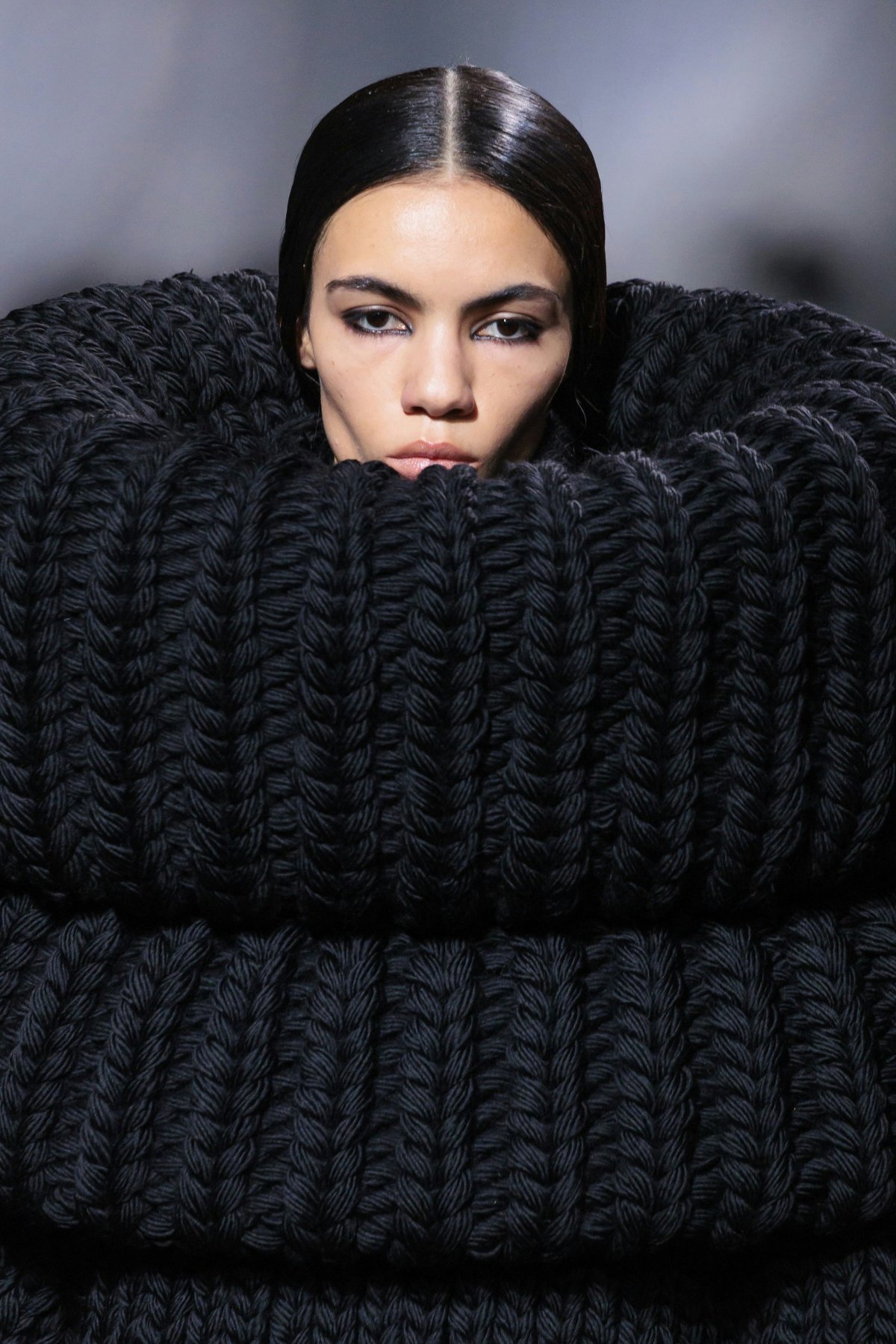 adult female person woman face head blanket clothing knitwear sweater