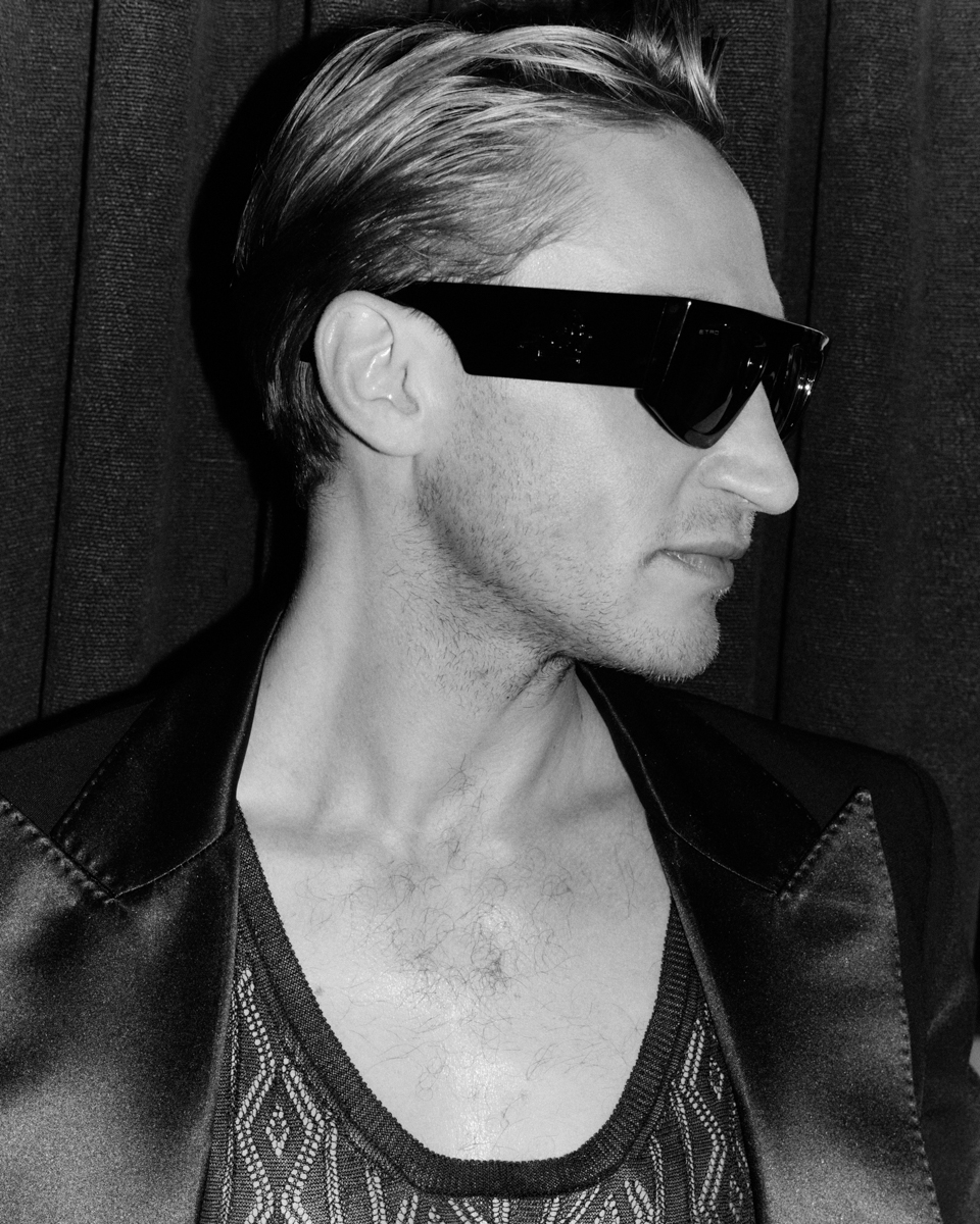 sunglasses face head neck person adult male man coat hair