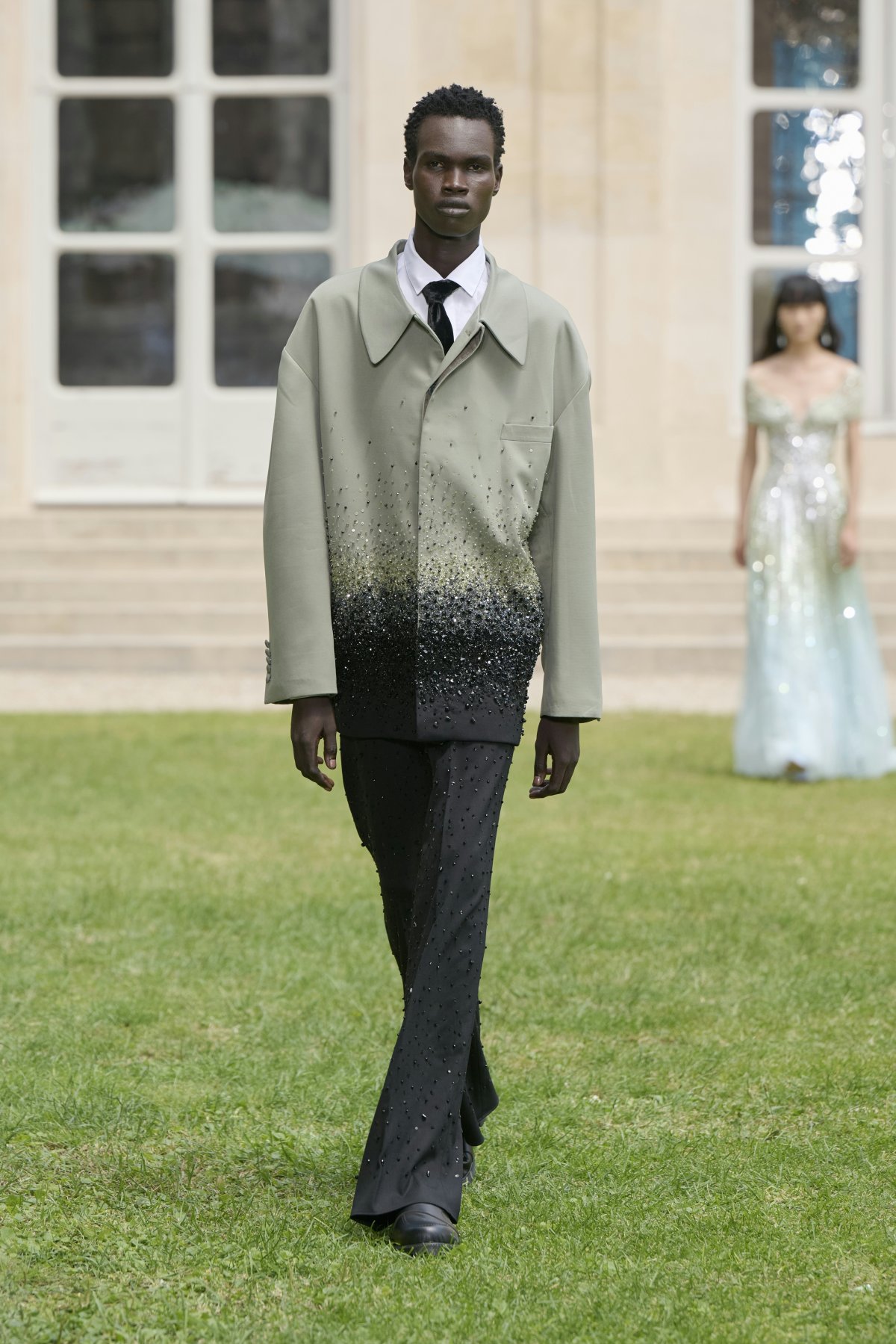 formal wear suit coat adult male man person fashion tuxedo grass