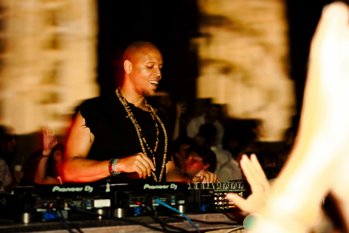 adult male man person concert crowd jewelry necklace face baby