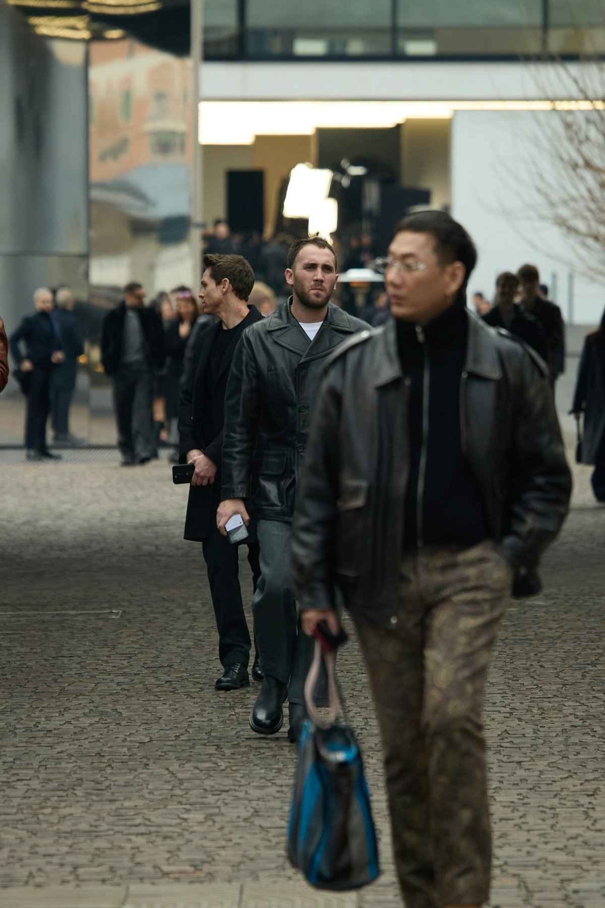 coat jacket bag handbag adult male man person shoe purse