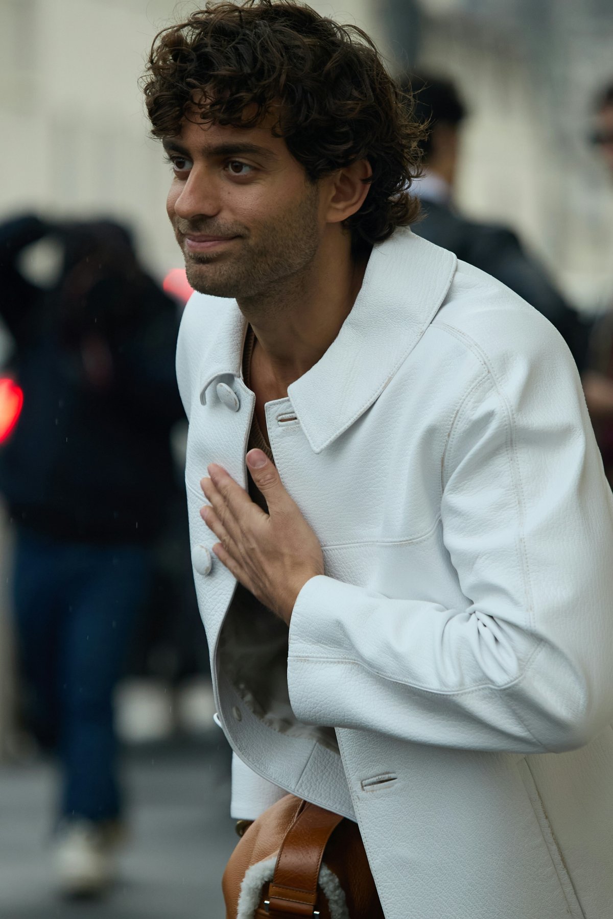 finger person long sleeve shirt coat handbag adult male man suit