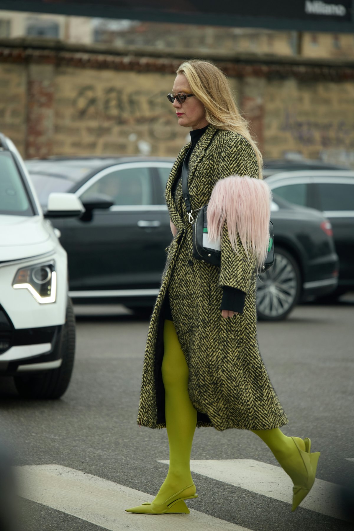 coat high heel shoe adult female person woman spoke alloy wheel tarmac