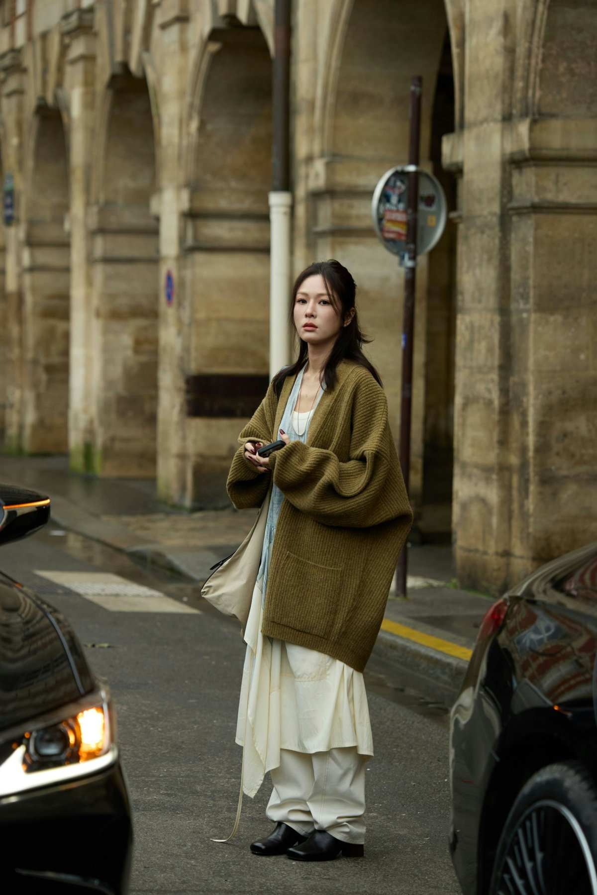 coat spoke alloy wheel tire wheel adult female person woman long sleeve