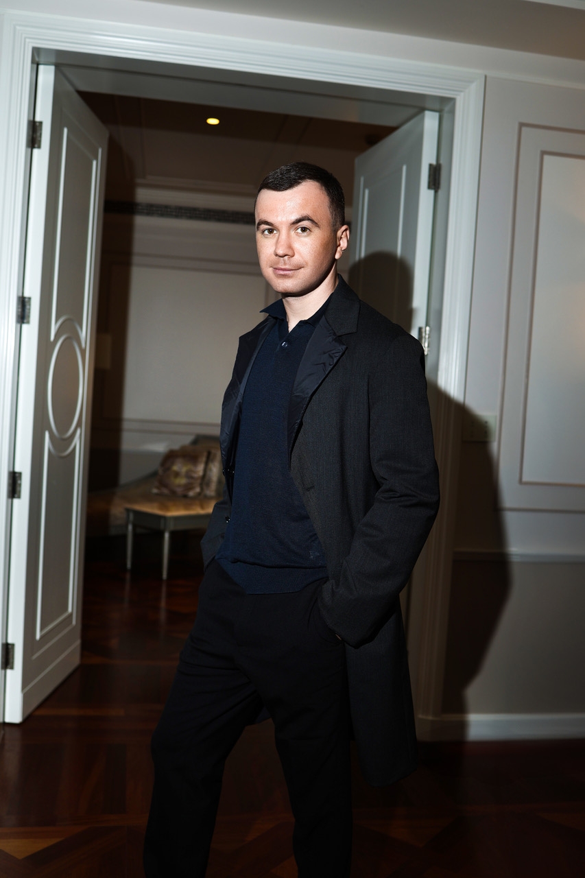 formal wear suit coat blazer jacket flooring wood adult man person