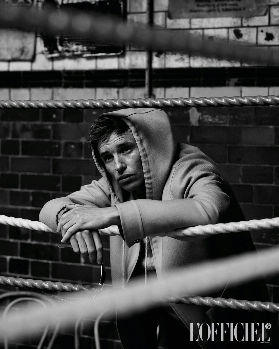 Wool hoodie with striped sweater, VALENTINO; glasses, RAY-BAN