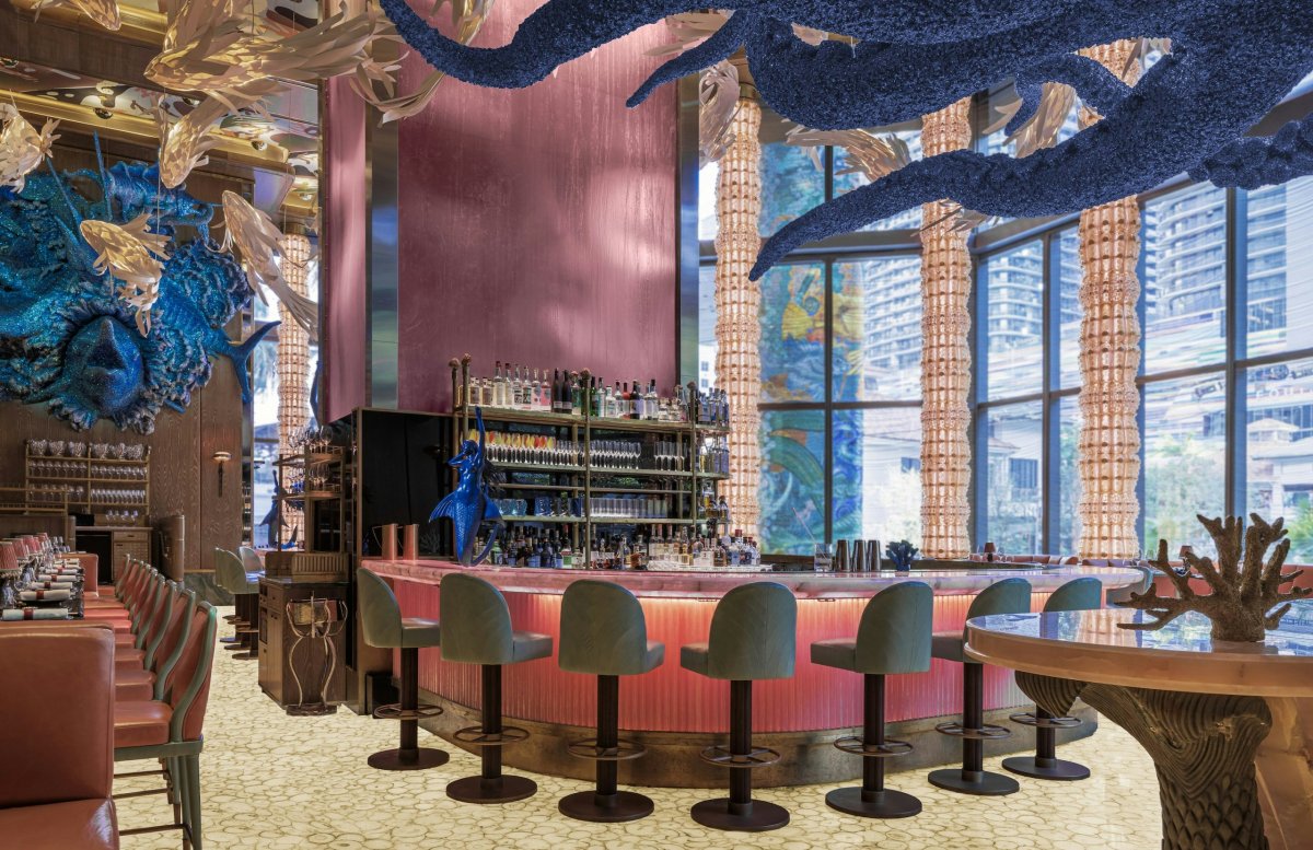 dining table furniture table chair indoors restaurant dining room bar desk person