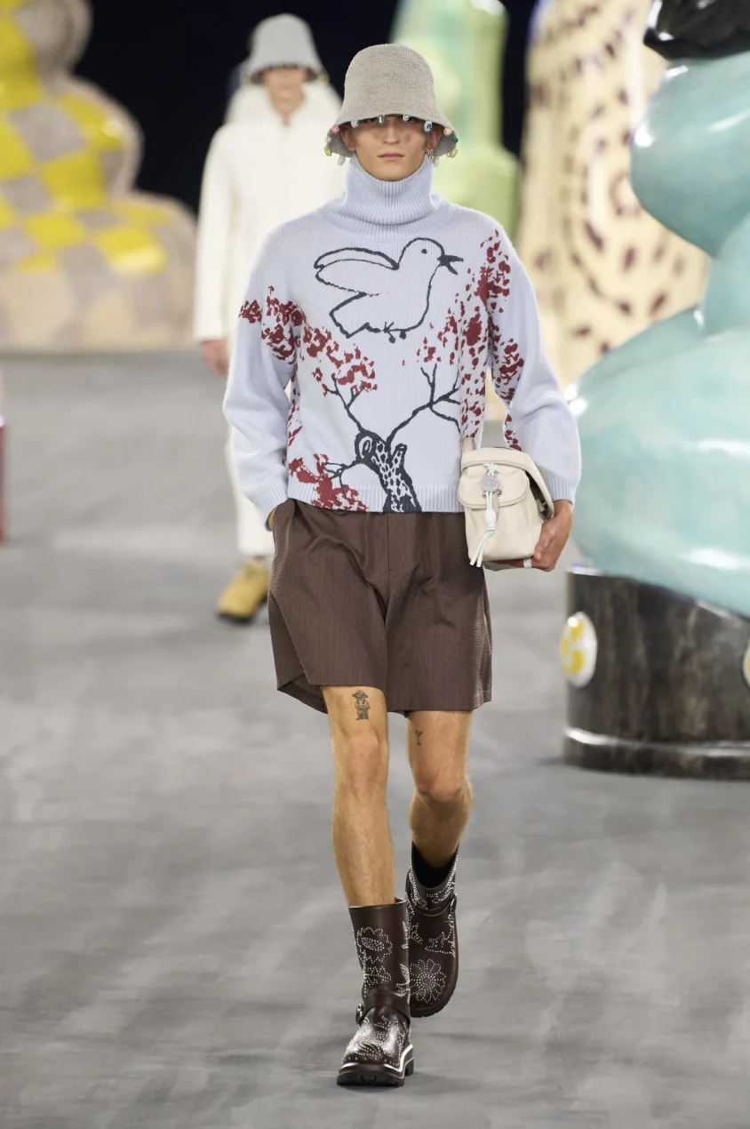 clothing shorts fashion hoodie knitwear sweater sweatshirt person