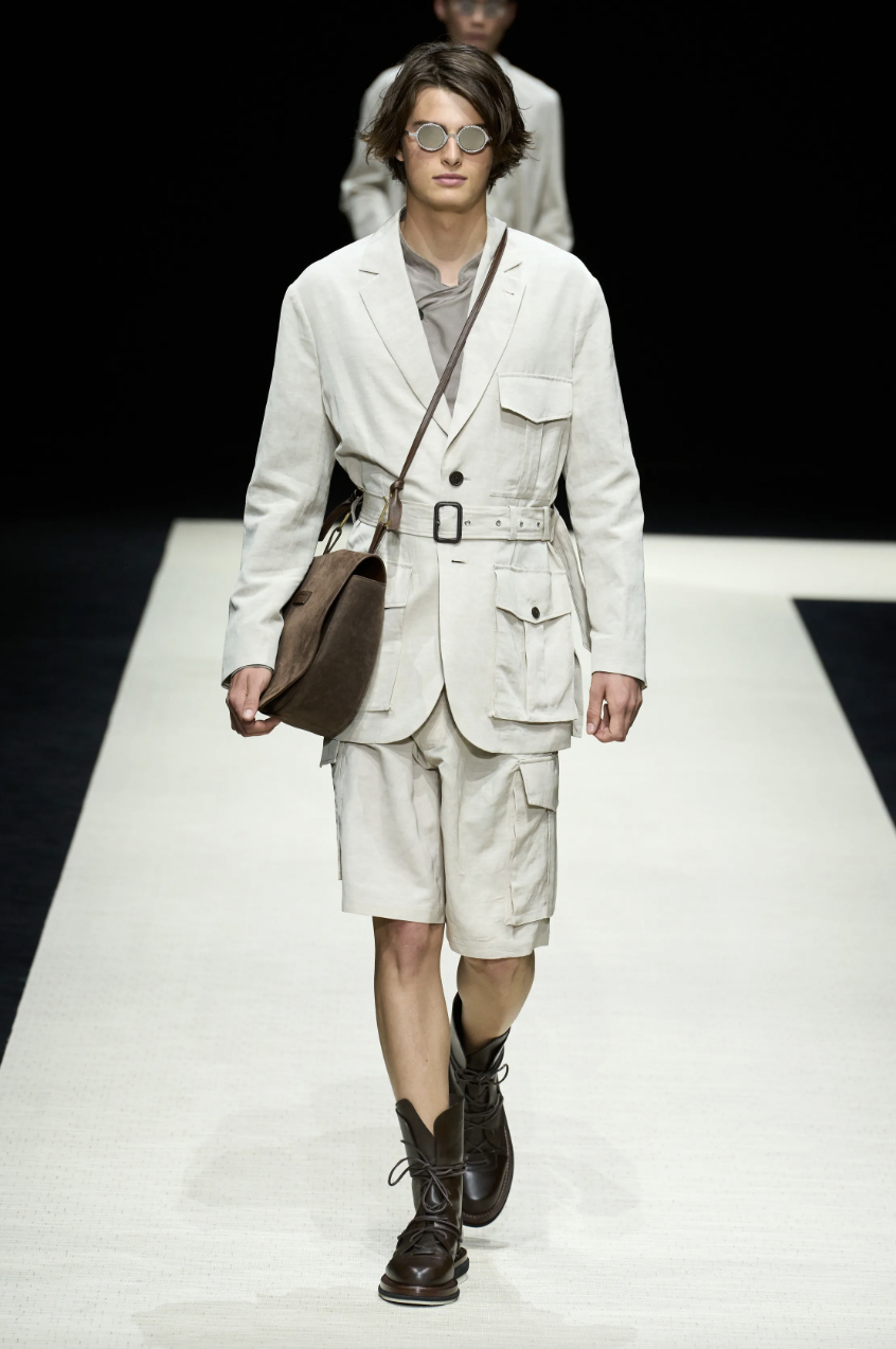 clothing coat fashion adult male man person bag handbag suit