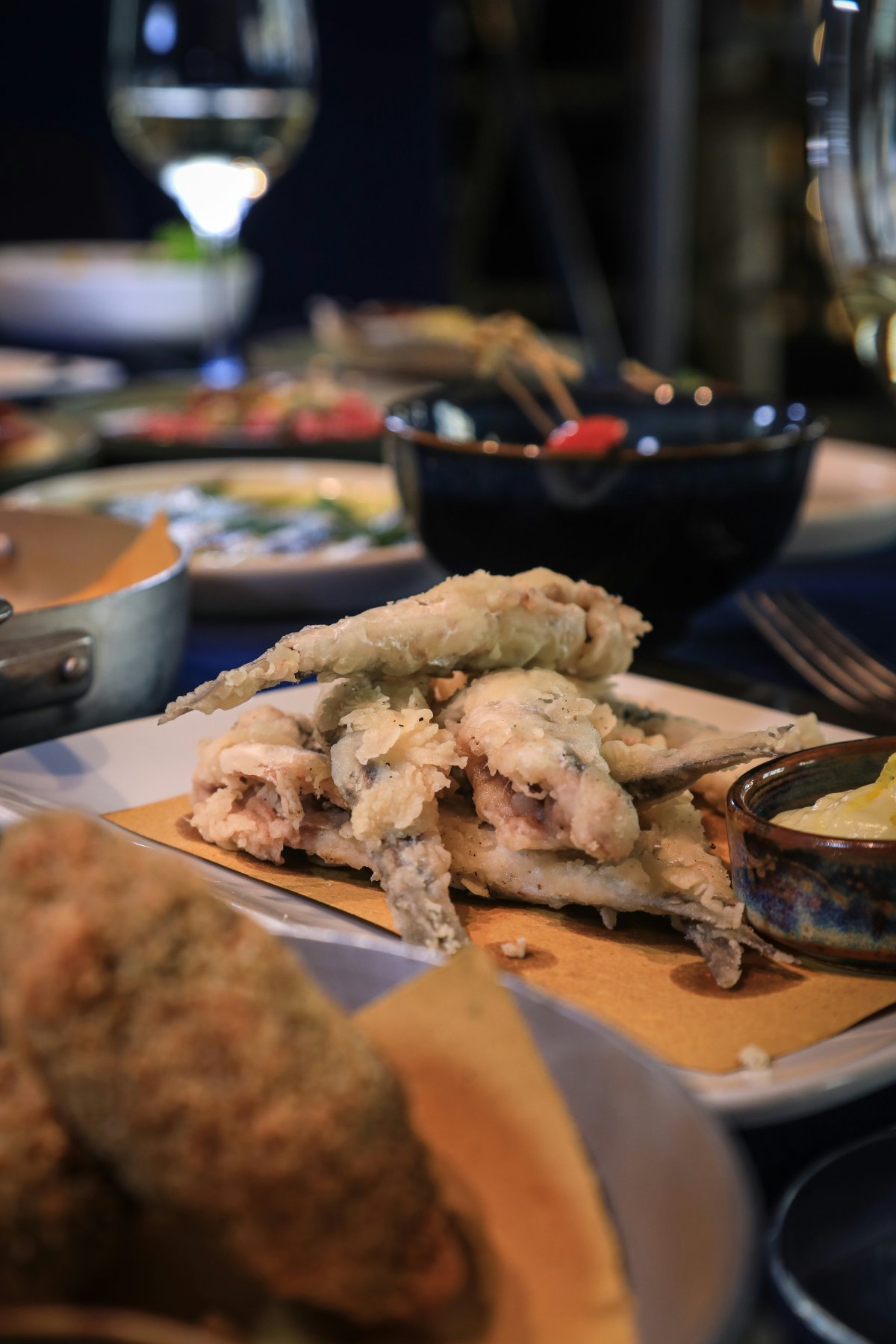 polpo food meal dish lunch cutlery fork food presentation dinner plate bread