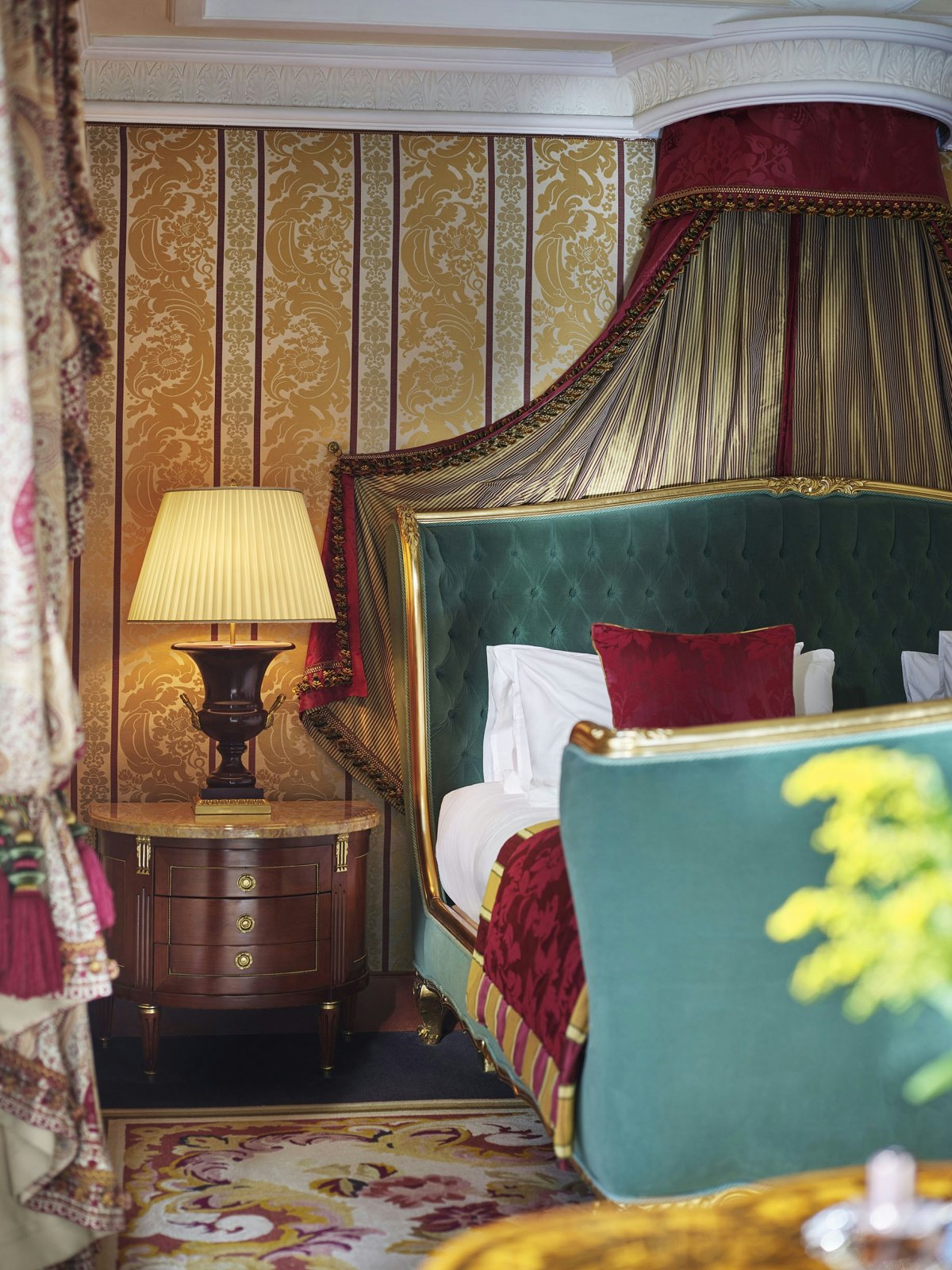 lamp table lamp indoors bed furniture bedroom room home decor rug