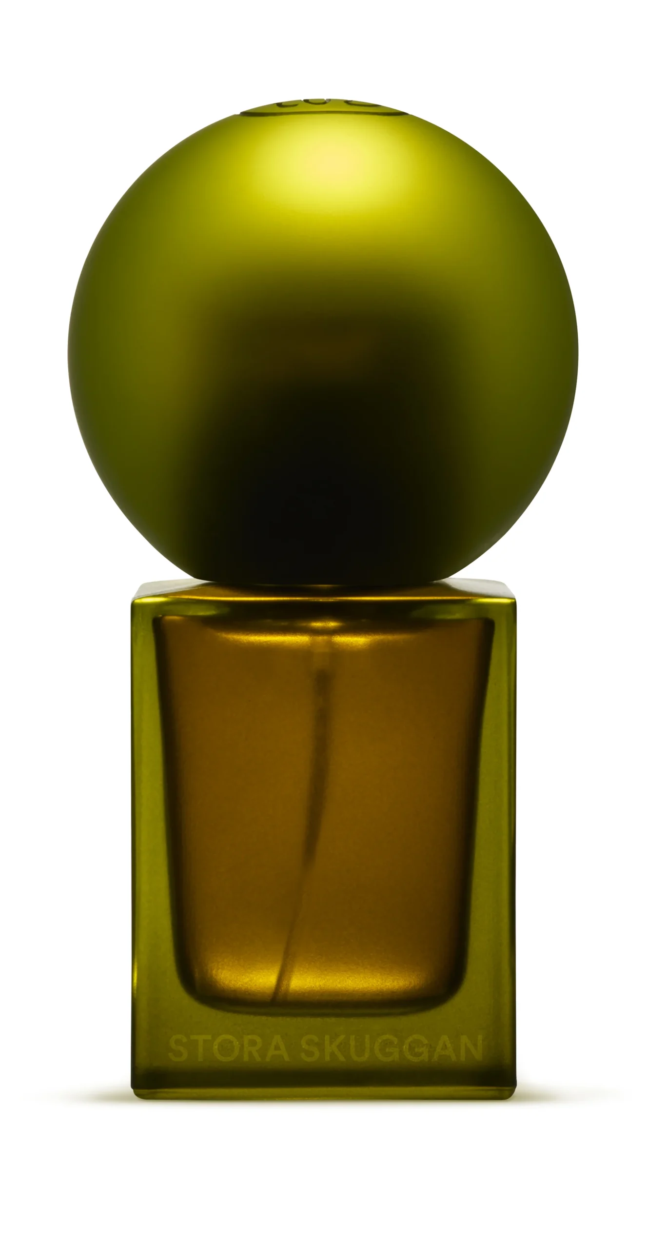 A Stora Skuggan perfume bottle with a large spherical green cap and a square glass base against a white background